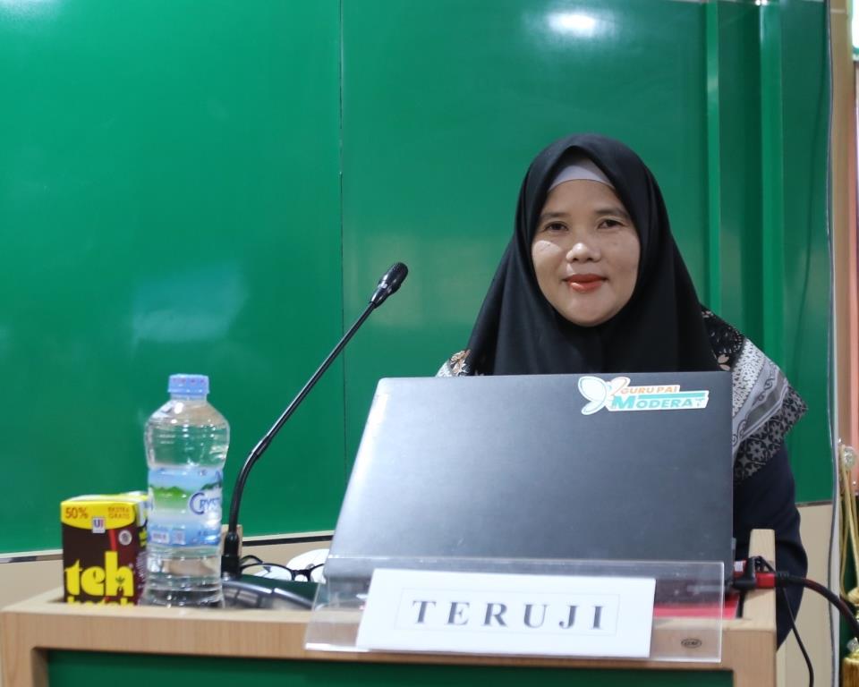 Promovenda Kamaliah, sebelum mengikuti Ujian Promosi Doktor (Foto:Humas/Zulkifli Ariyadi)