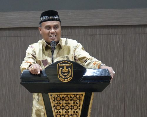 Staf Ahli Wali Kota Banjarmasin Bidang Hukum, Politik, dan Pemerintahan Dr. H. Lukman Fadlun, M.H. saat memberikan sambutan (Foto:Humas/Hadi Rustami)