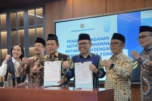 Foto bersama usai penandatangan MoU dengan jajaran pejabat Kemenhaj dan umrah (Foto:Istimewa)