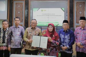Foto bersama usai penandatanganan MoU (Foto:Humas/Neco EP)