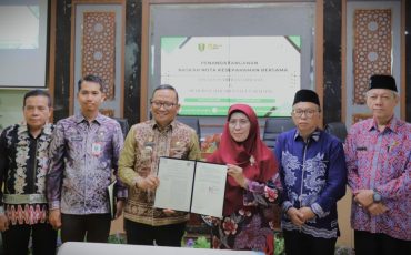 Foto bersama usai penandatanganan MoU (Foto:Humas/Neco EP)