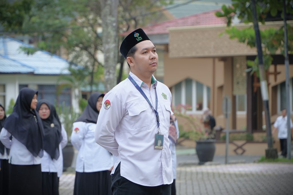 Robidinnoor, S.Kom. saat bertugas menjadi Pemimpin Apel (Foto:Humas/Neco EP)