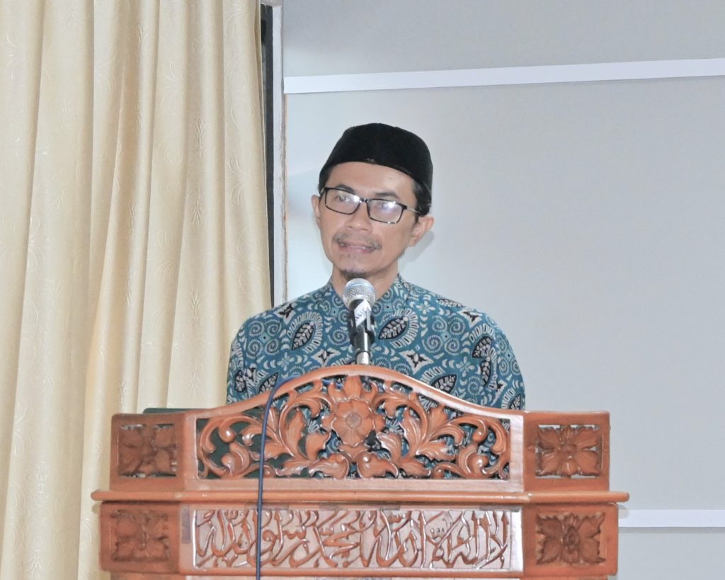 H. Muhammad Syamsudin Noor, M.A. saat menyampaikan laporan.